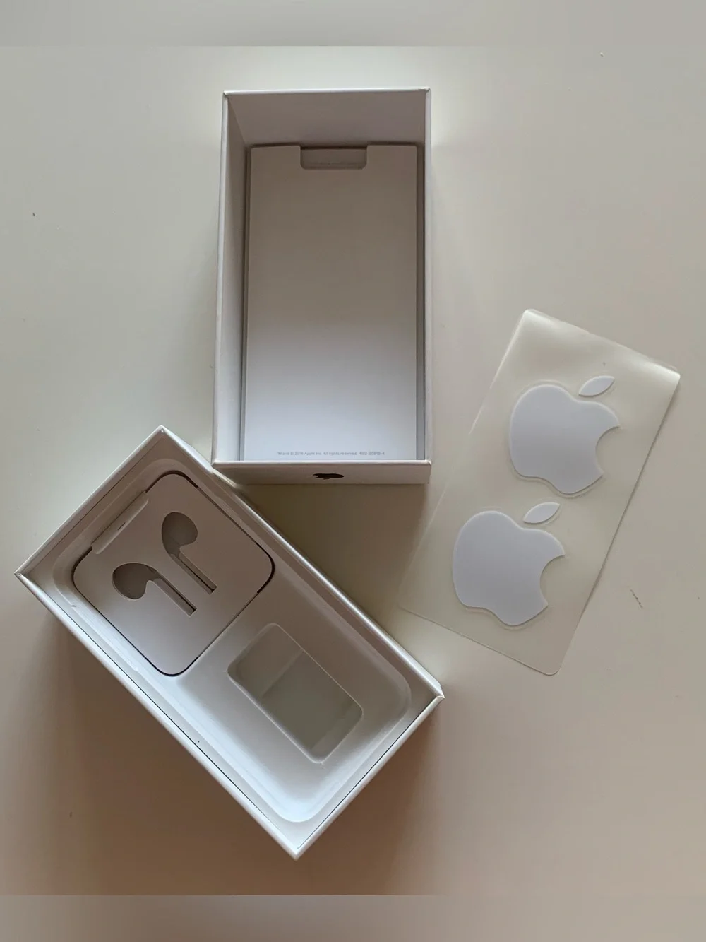 Empty iPhone 7 Box and Apple Stickers
